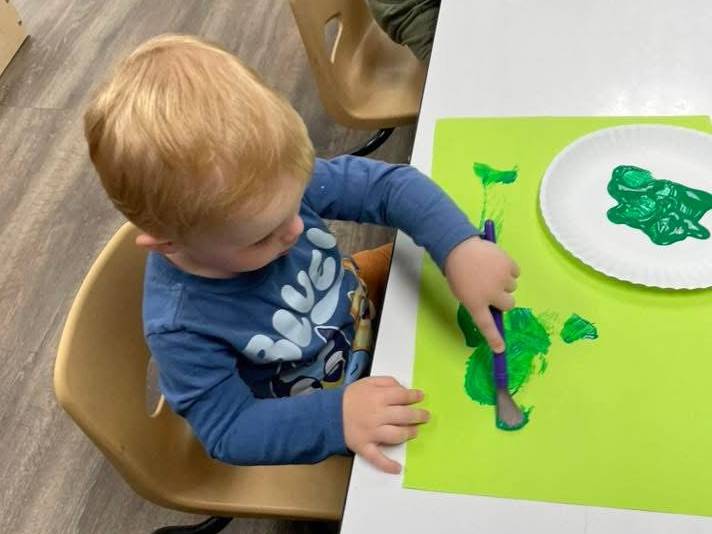 boy doing a painting
